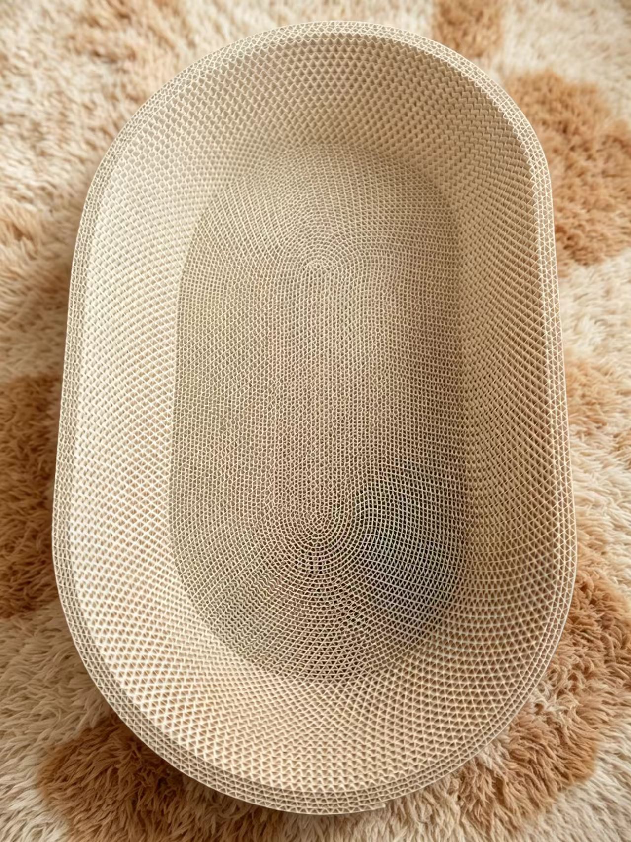 Oval corrugated cat scratcher 